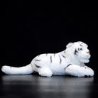 Side view of a realistic white tiger stuffed animal with soft fur and detailed stripes for collectors
