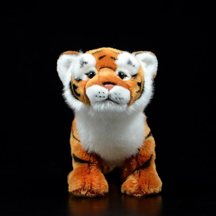 Front view of an adorable tiger cub stuffed animal with lifelike details and soft, cuddly fur
