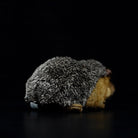 Rear view of a hedgehog stuffed animal, highlighting its detailed spiny texture