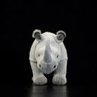 Front view of SoftDaysLab white rhino plush toy, showcasing its lifelike horn and square-lipped design