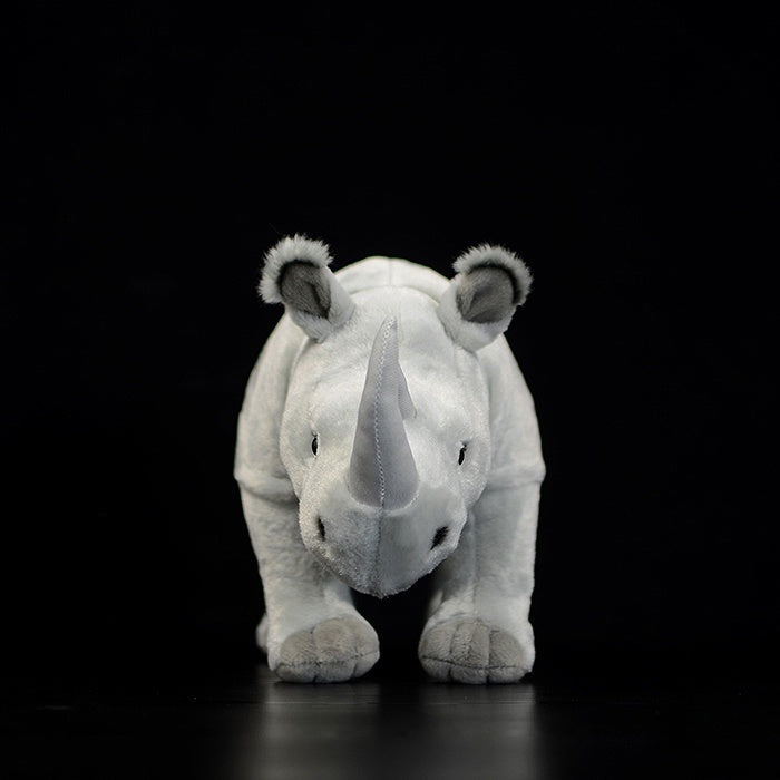 Front view of SoftDaysLab white rhino plush toy, showcasing its lifelike horn and square-lipped design