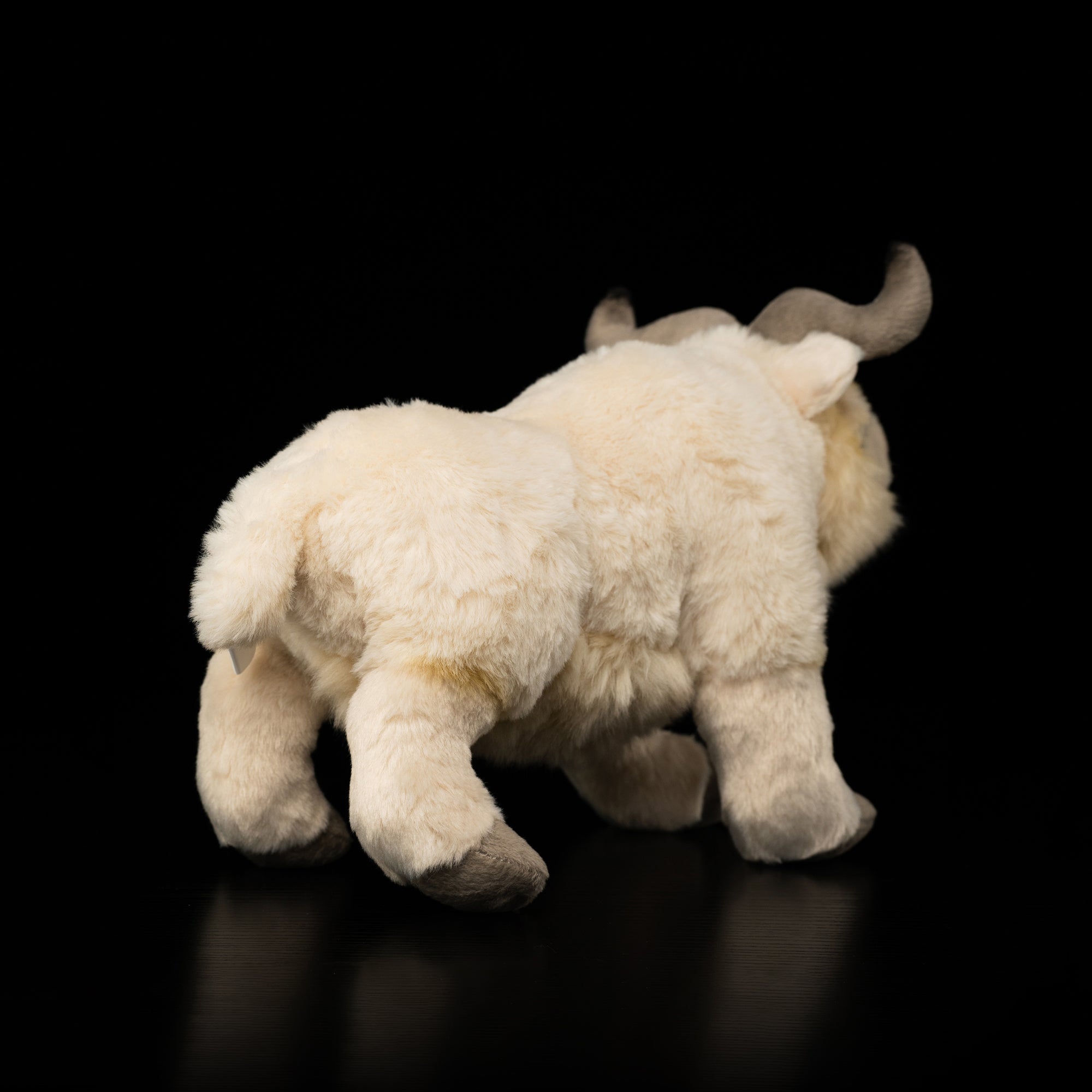 Rear view of takin stuffed animal by SoftDaysLab®, showing soft, fluffy fur and natural detailing