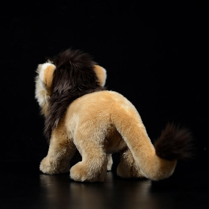 Rear view of a lion plush toy, highlighting its fluffy tail and soft, realistic design