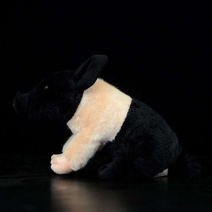 Side profile of teacup pig plush in black and white, designed with adorable detail by SoftDaysLab