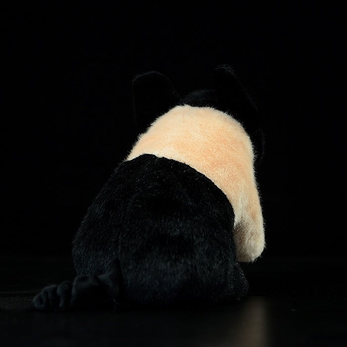 Back view of black and white pig plush toy with a curled tail and soft fur texture by SoftDaysLab