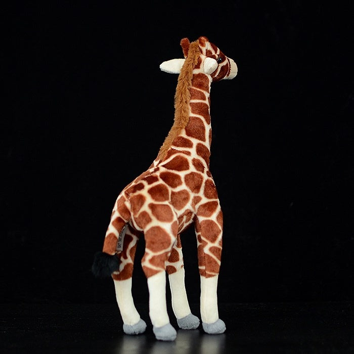 Back view of a giraffe plush toy highlighting its detailed design and soft, realistic textures
