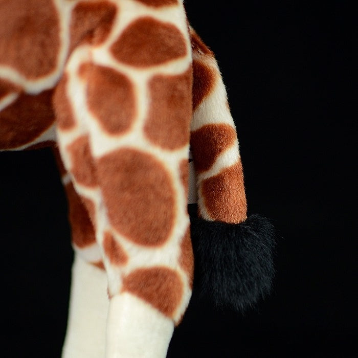 Tail detail of a giraffe plush toy with realistic fur and high-quality craftsmanship