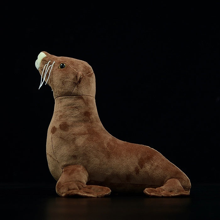 Side profile of a lifelike fur seal plush toy showcasing its realistic design and brown fur