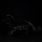 Profile of a black panther plush toy with sleek, soft fur, ideal for jungle-themed decor or gifts