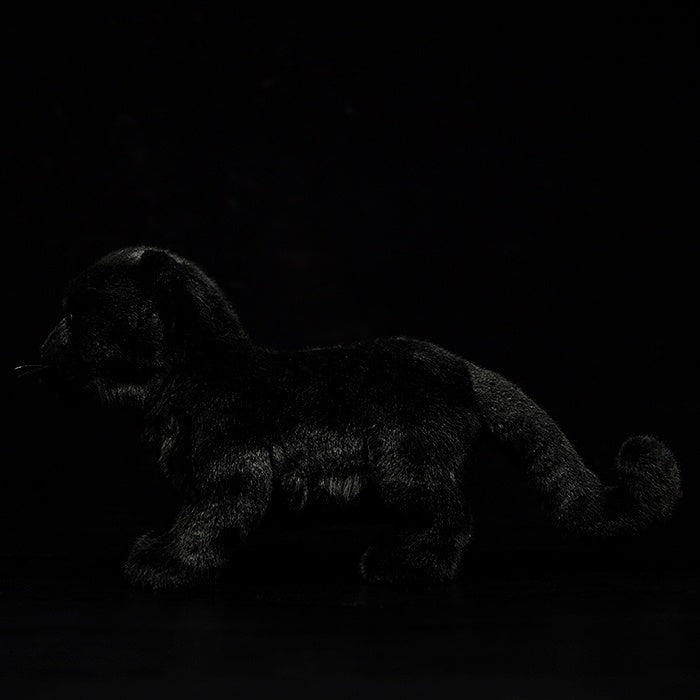 Profile of a black panther plush toy with sleek, soft fur, ideal for jungle-themed decor or gifts