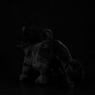 Back view of a black panther cub plush showcasing its realistic fur texture and playful design