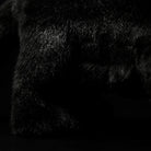 Detailed shot of a black panther plush paw, featuring soft, high-quality fur for a realistic feel
