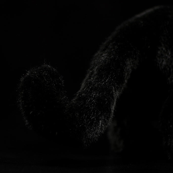 Close-up of a black panther plush tail with a soft, curved design, perfect for wildlife-themed collections