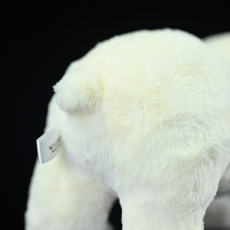 Rear view of the polar bear plush toy, showing its cute tail and premium-quality craftsmanship