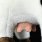 Close-up of the udder on a Holstein cow plush, showcasing its fine details and realistic appearance