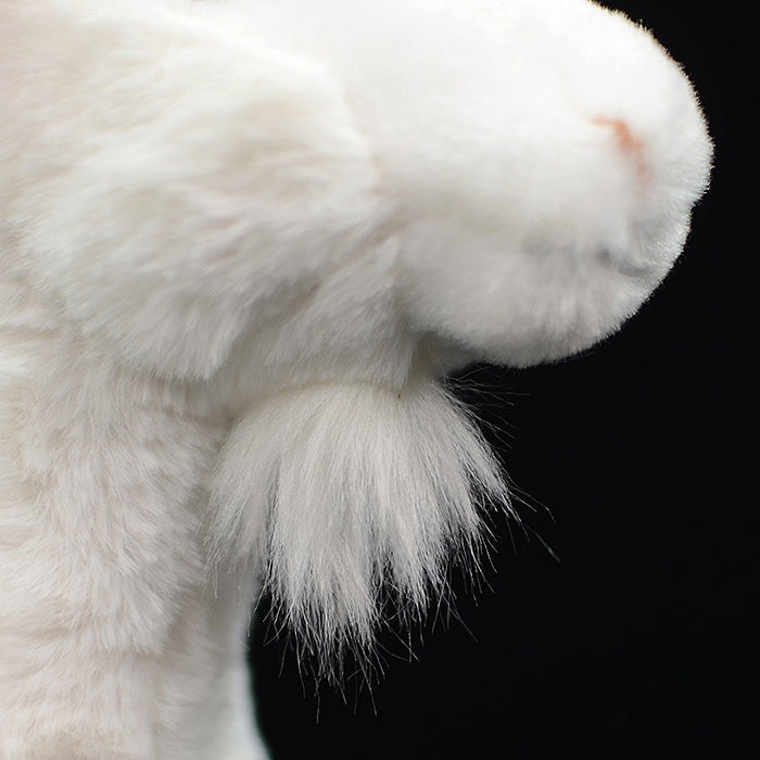 Detailed view of the goat plush toy's soft white beard, showcasing lifelike craftsmanship