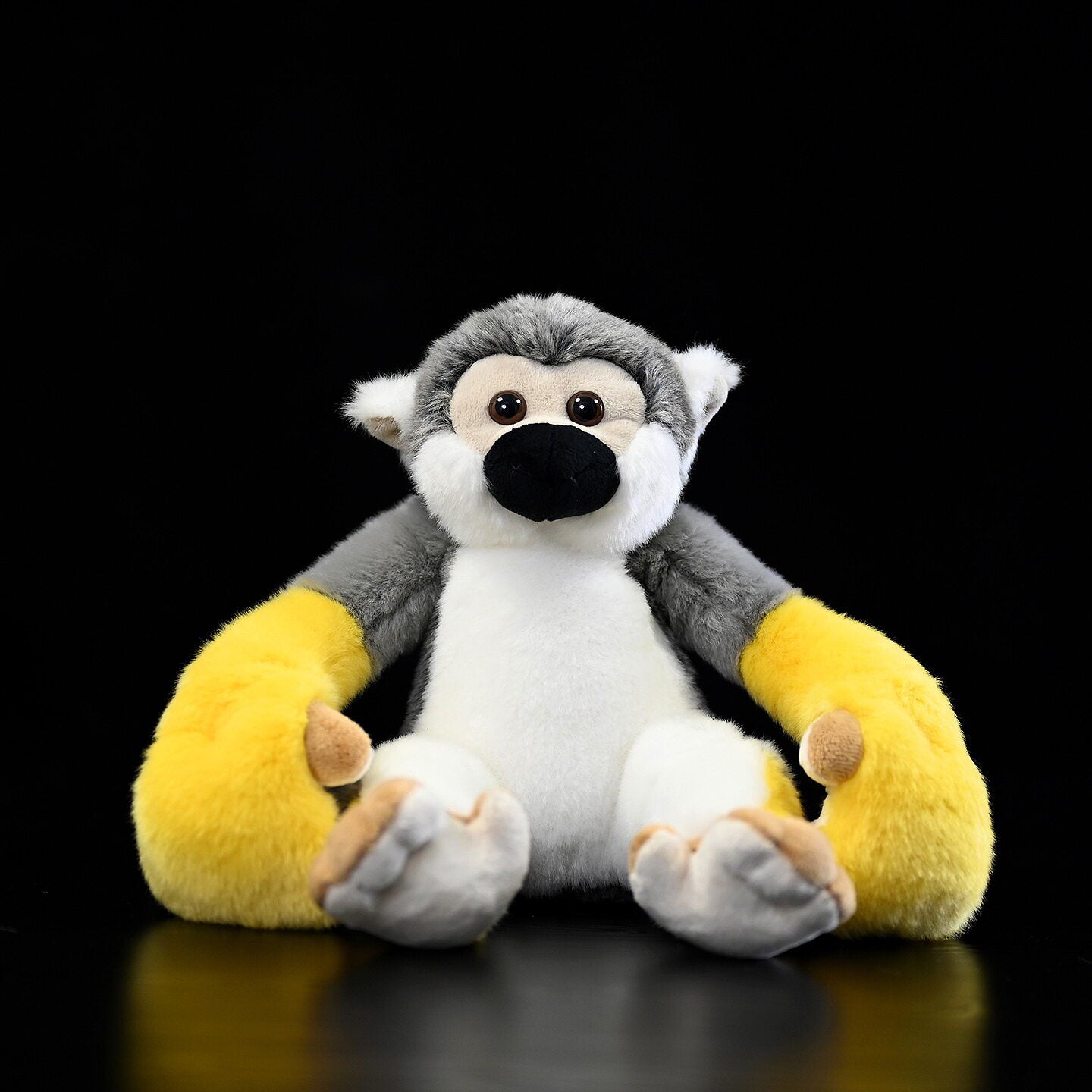Frontal view of lifelike Common Squirrel Monkey plush by SoftDaysLab, with adorable expressions