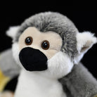 Close-up of Common Squirrel Monkey plush face by SoftDaysLab, with detailed and cute features