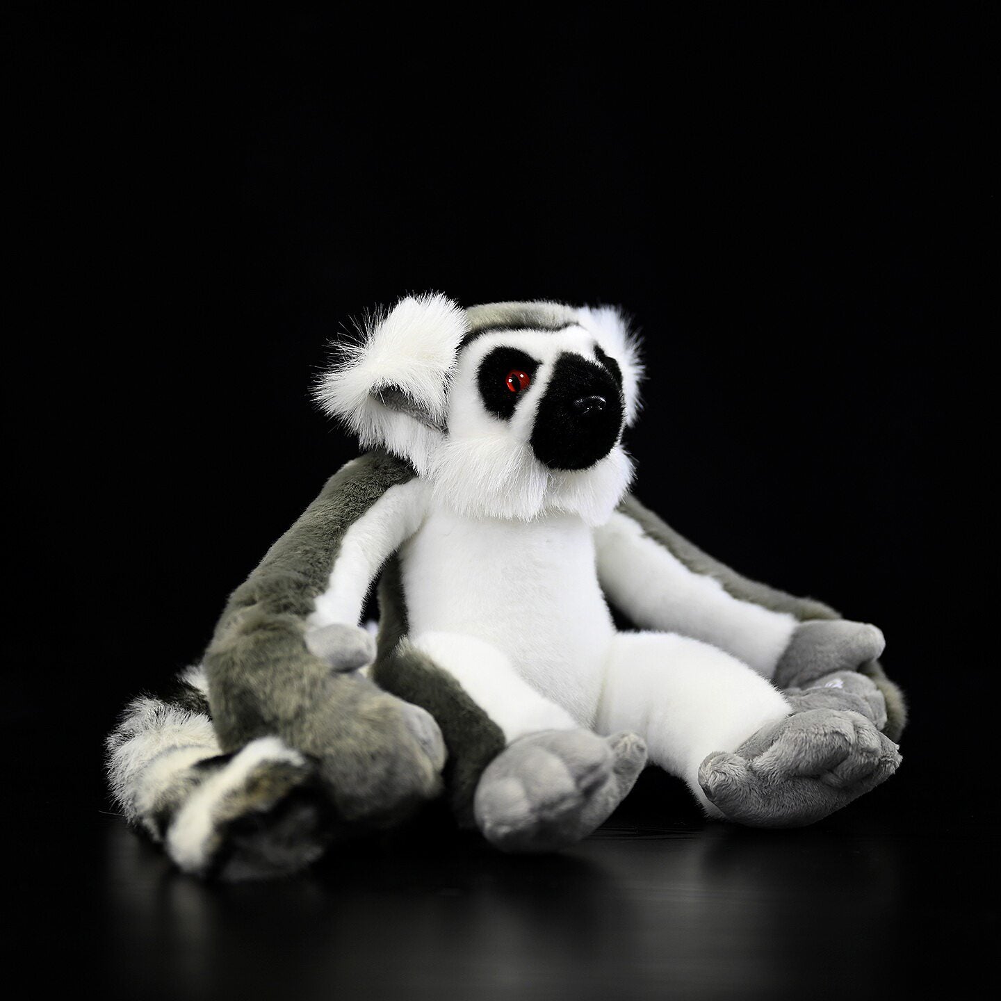 Realistic Ring-tailed Lemur plush sitting pose, with handcrafted details and cuddly fur