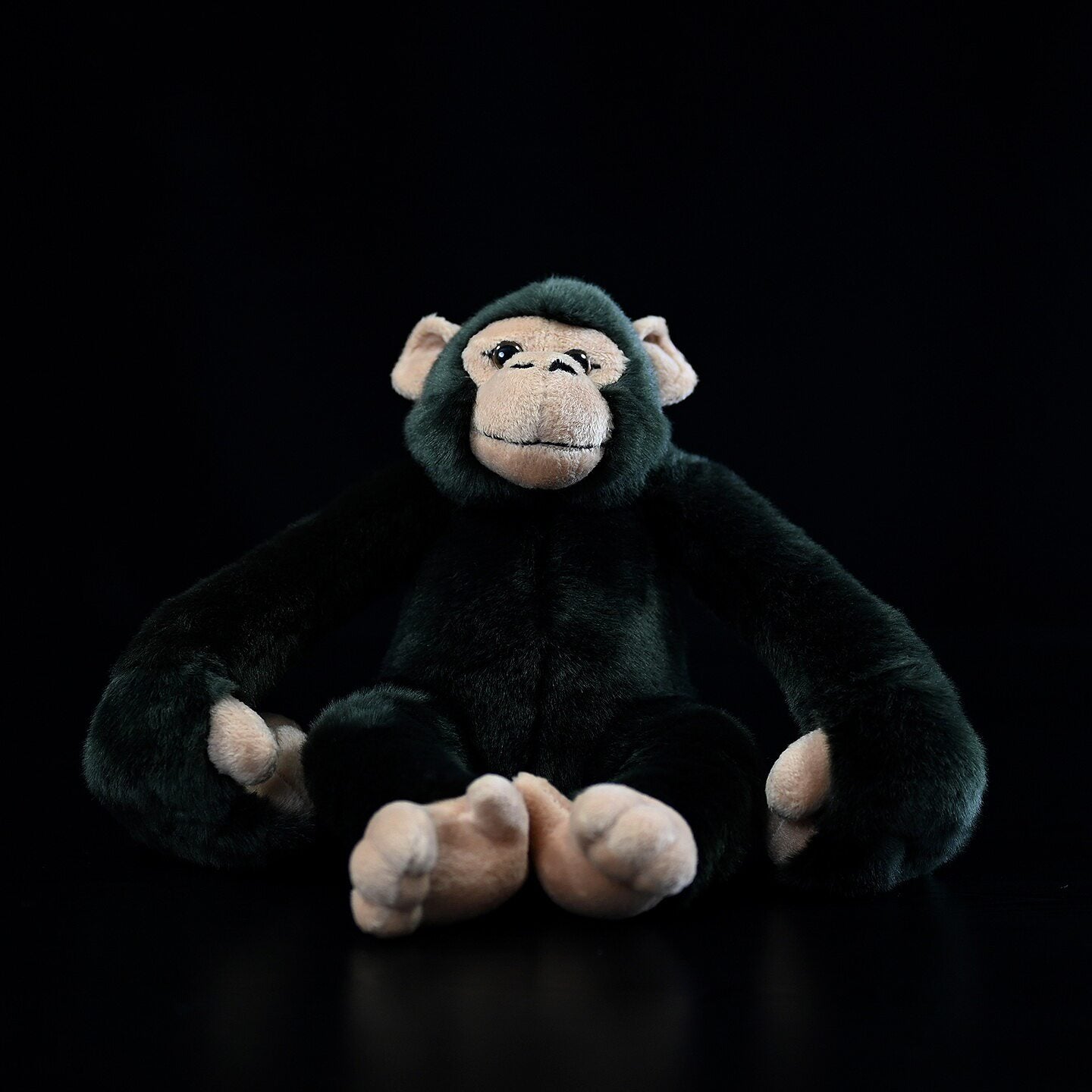Seated lifelike chimpanzee plush by SoftDaysLab, ideal for an authentic wildlife-themed display