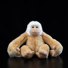 Hanging gibbon plush by SoftDaysLab sitting with long arms, realistic Hylobates lar stuffed monkey