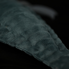 Close-up of plush Megalograptus’s soft, textured body, mimicking the ancient sea scorpion’s segmented tail