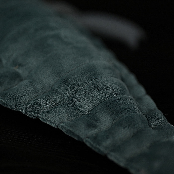 Close-up of plush Megalograptus’s soft, textured body, mimicking the ancient sea scorpion’s segmented tail