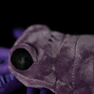 Detailed close-up of the SoftDaysLab Carcinosoma plush toy's eye, inspired by prehistoric eurypterids
