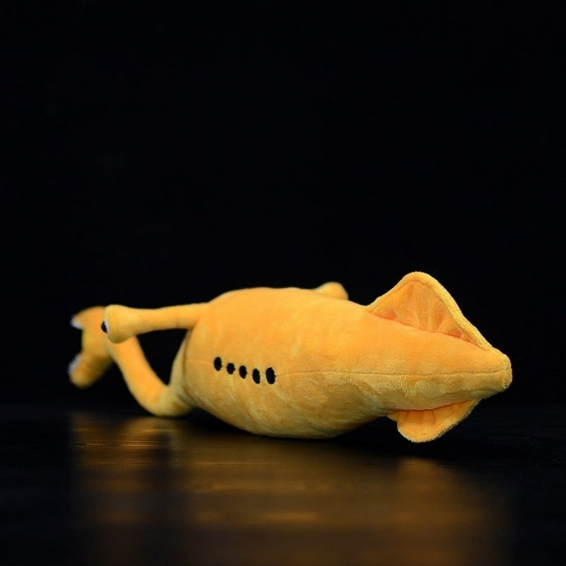 Rear view of Tully Monster plush toy highlighting its triangular tail fin and soft texture by SoftDaysLab