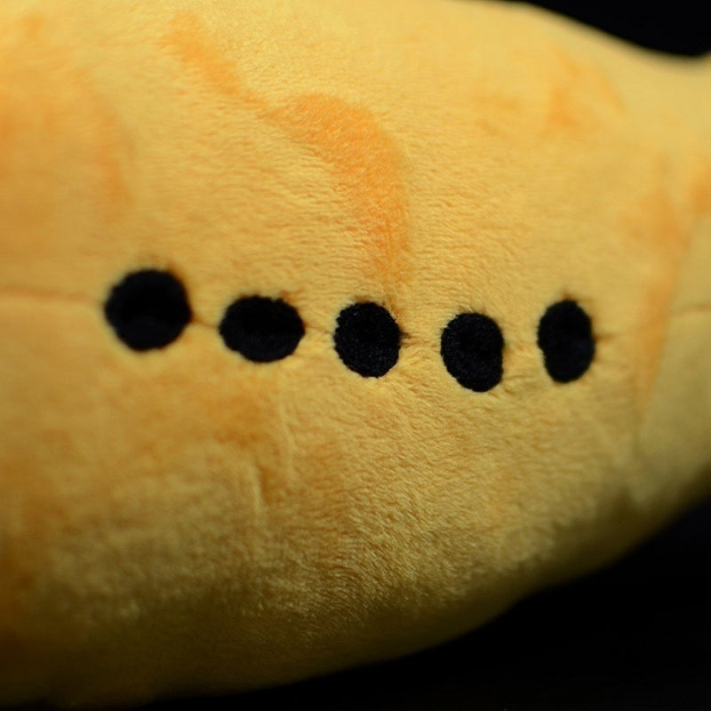 Detailed view of black spot pattern on Tully Monster plush’s side, replicating the fossil creature’s unique design