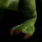 Close-up of T-Rex dinosaur plush toy’s realistic claws, perfect for dinosaur-themed gifts or display