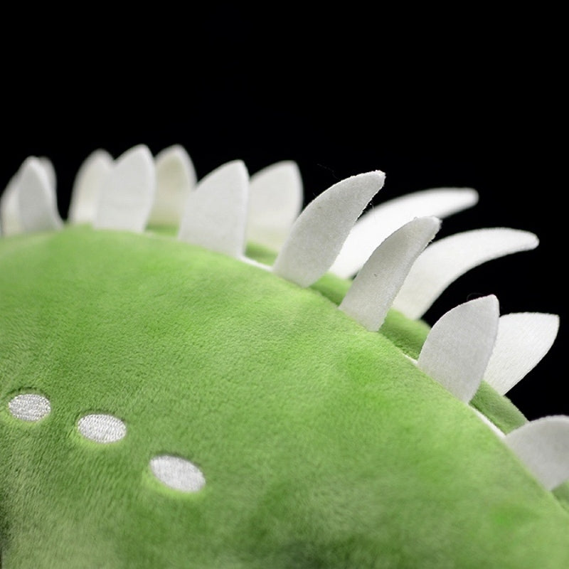 Close-up of Huayangosaurus dinosaur plush toy’s spiked back with intricate and realistic design