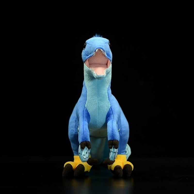 Front view of Microraptor dinosaur plush toy showcasing its welcoming expression and realistic design