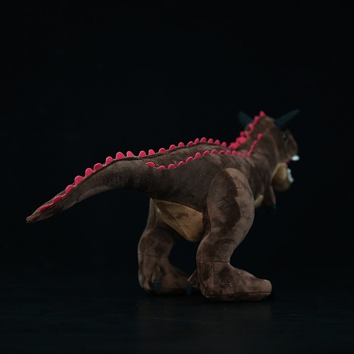 Back angle of Carnotaurus Dinosaur Plush Toy displaying tail and spine details