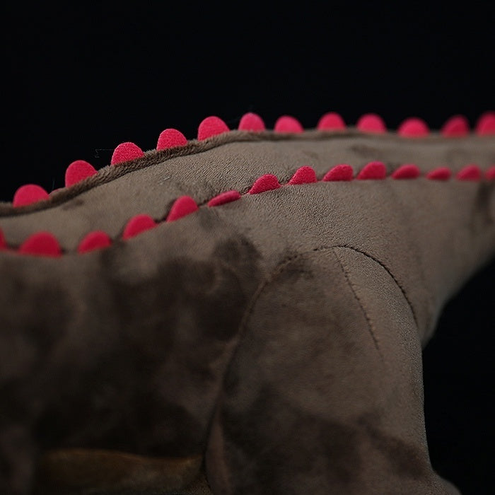 Spine and back details of Carnotaurus Dinosaur Plush Toy showcasing red ridges