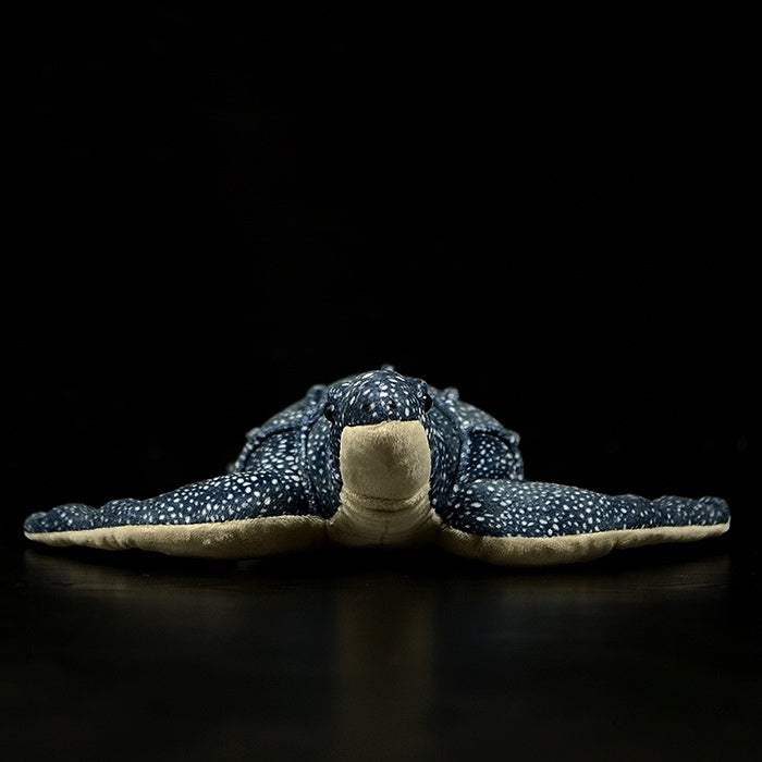 Front view of a leatherback sea turtle plush, highlighting its lifelike structure and cuddly design
