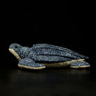 Side view of a leatherback sea turtle plush, showcasing its detailed flippers and realistic design