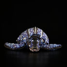 Front view of a lifelike leatherback sea turtle plush with intricate patterns and realistic design