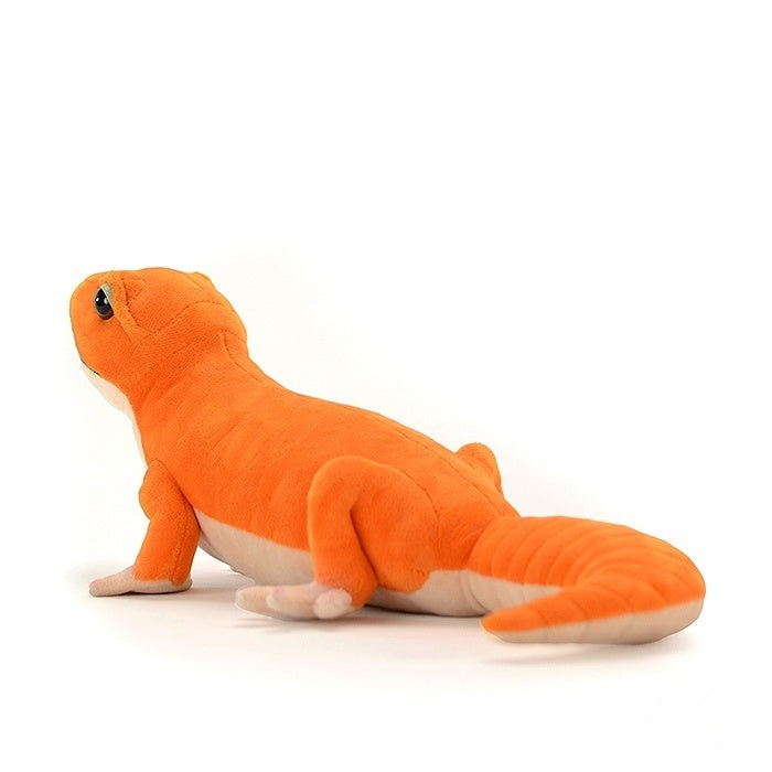 Side view of the Amel Patternless African Fat-Tailed Gecko Plush, highlighting its soft texture and bold design