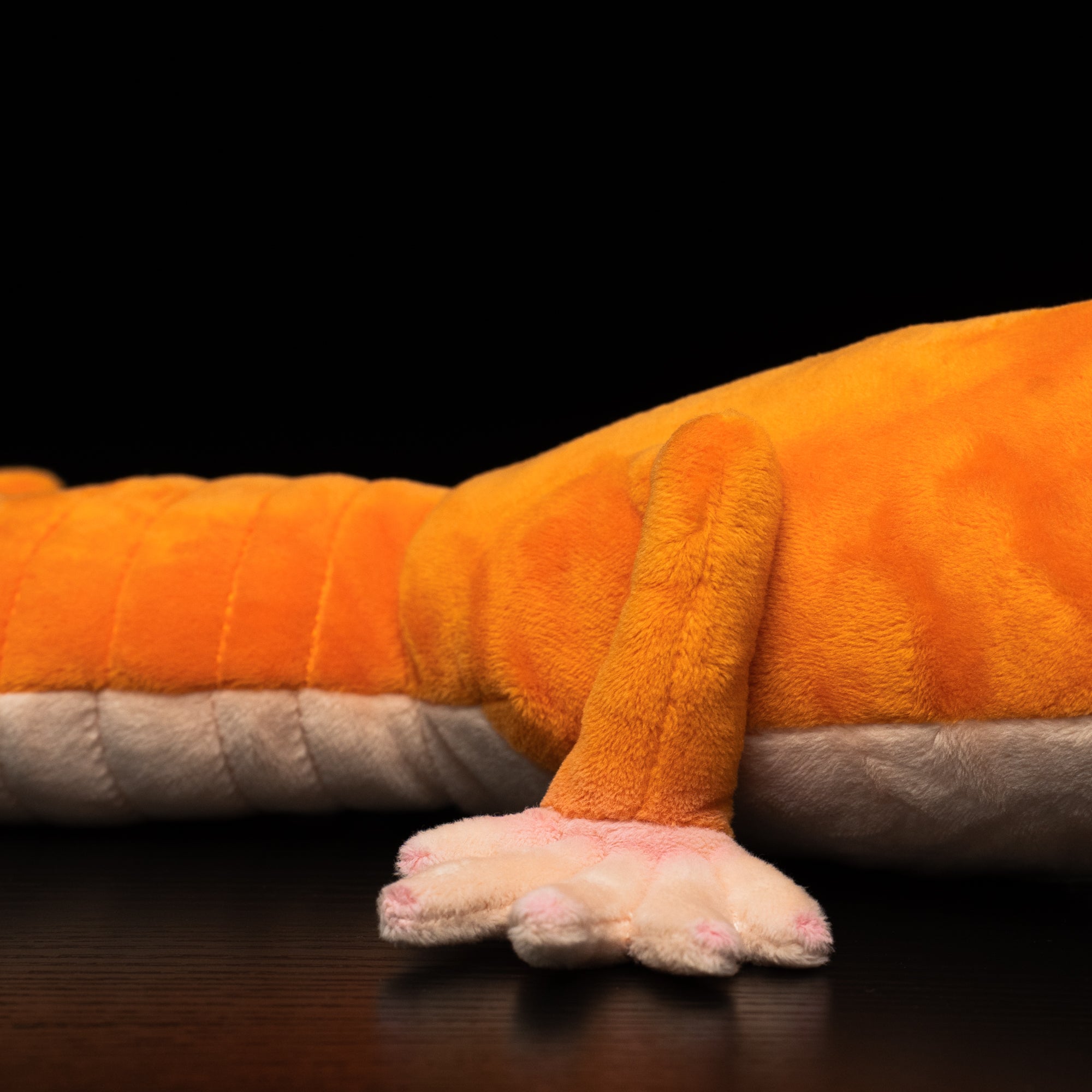 Close-up of the plush leg of a lifelike Amel Patternless African fat-tailed gecko stuffed toy, highlighting its soft texture by SoftDaysLab