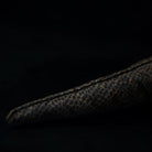 Close-up of the Komodo dragon plush toy’s tail, highlighting the scaly texture