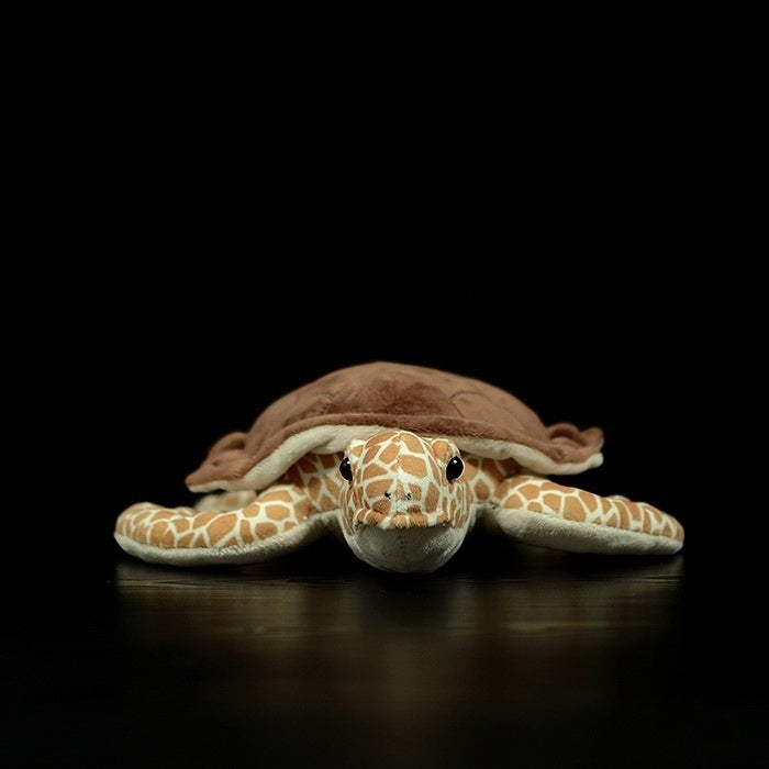 Lifelike Hawksbill sea turtle plush toy showing its detailed face and realistic design