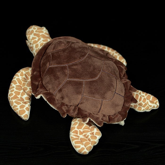 Top view of a Hawksbill sea turtle plush toy, highlighting its detailed shell and lifelike flippers