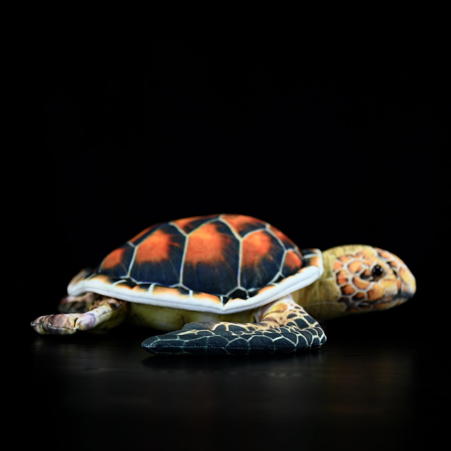 Side view of lifelike Hawksbill Sea Turtle plush, showcasing realistic texture and detailed design