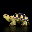 Side view of a lifelike Sulcata Tortoise plush showcasing realistic patterns and textures for turtle lovers