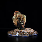 Back view of the monocled cobra plush toy highlighting the detailed hood pattern and soft texture