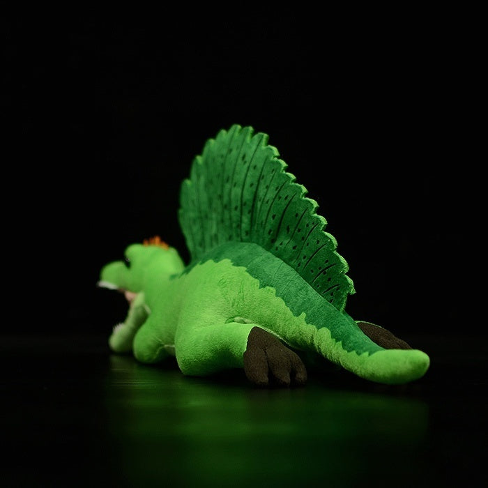 Rear view of Spinosaurus plush toy highlighting textured sail and soft toy craftsmanship