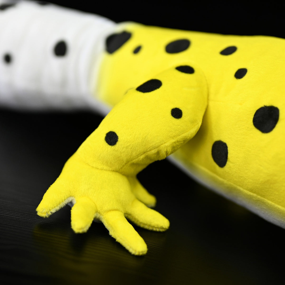 Close-up of Leopard Gecko Plush paw by SoftDaysLab®, featuring lifelike spots and soft material