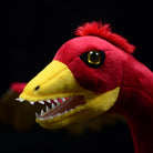Close-up of Archaeopteryx plush head by SoftDaysLab®, featuring sharp beak, bright eyes, and vivid colors