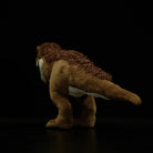 Rear view of Yutyrannus plush by SoftDaysLab®, displaying its textured back and flexible tail